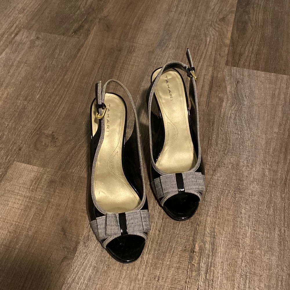 Tahari black and white high heeled sandals.